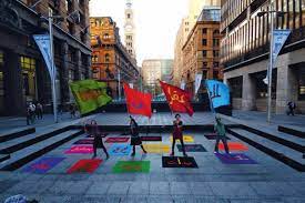 A performance of The Flag Project in a city square